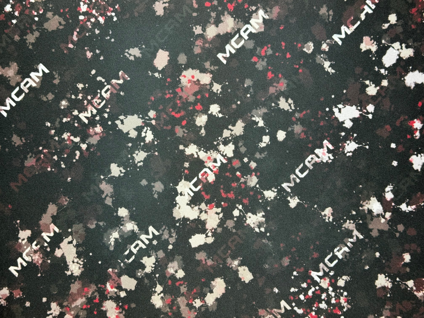 Military-themed 18x12 non-slip mat for weapon maintenance, showcasing a camouflage pattern, perfect for securely holding gun parts during cleaning. E-sports-ready 18x12 gaming mat, featuring a high-tech circuit board pattern, designed for precision mouse movement with a comfortable, anti-fray edge.