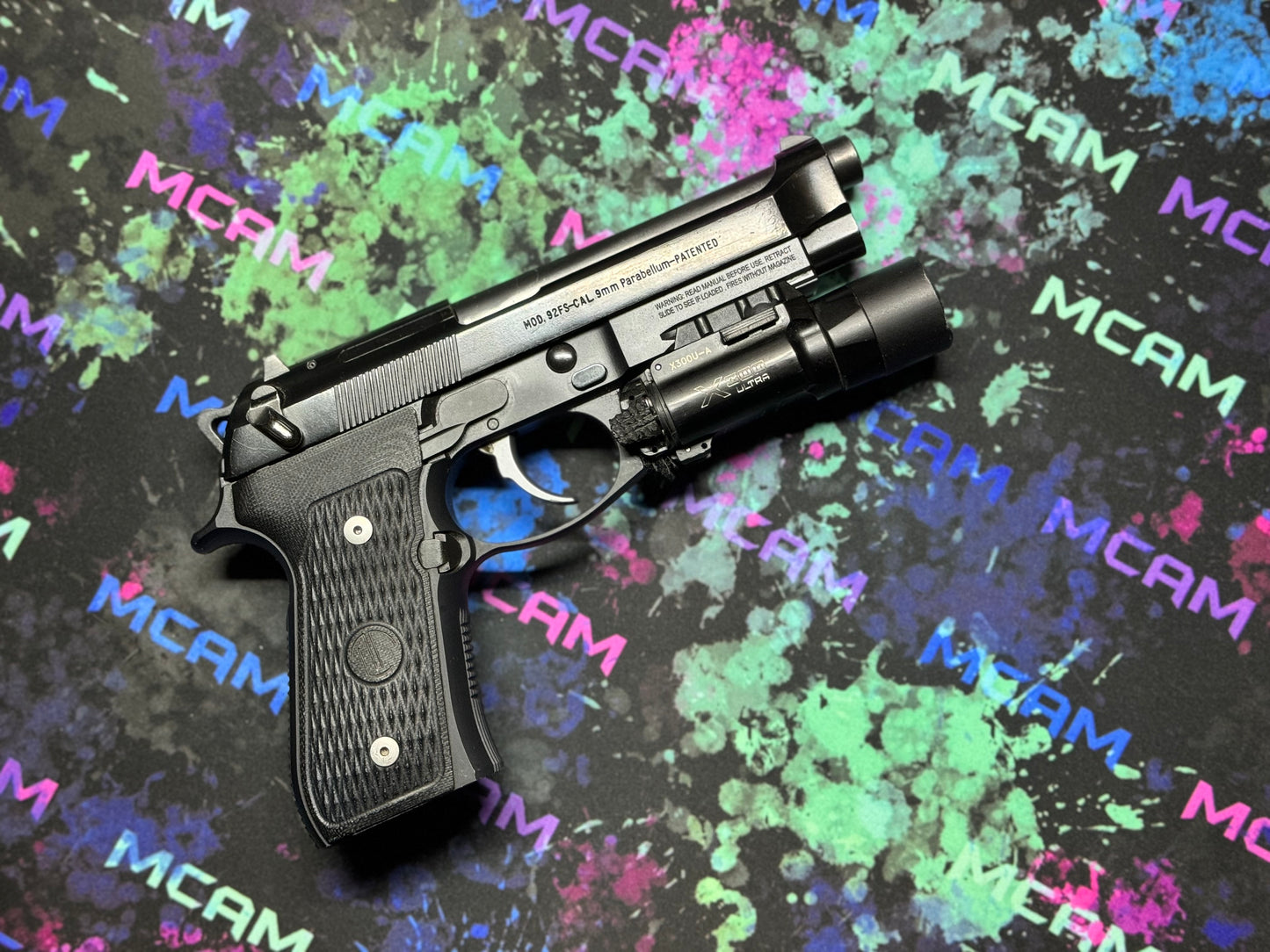 Military-themed 18x12 non-slip mat for weapon maintenance, showcasing a camouflage pattern, perfect for securely holding gun parts during cleaning. E-sports-ready 18x12 gaming mat, featuring a high-tech circuit board pattern, designed for precision mouse movement with a comfortable, anti-fray edge.