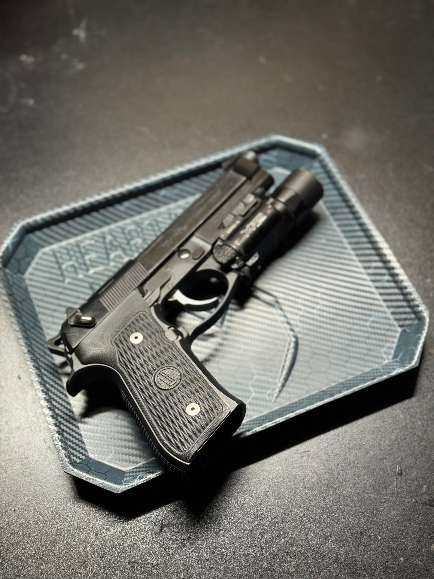 Durable Kydex dump tray in matte black, handcrafted with raised edges, perfect for organizing everyday carry items like keys, coins, and wallets.