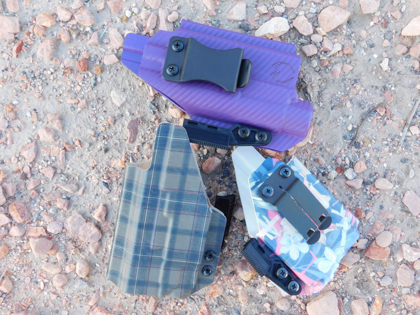 Custom-molded Kydex holster with RMR cut, compatible with popular reflex sights.