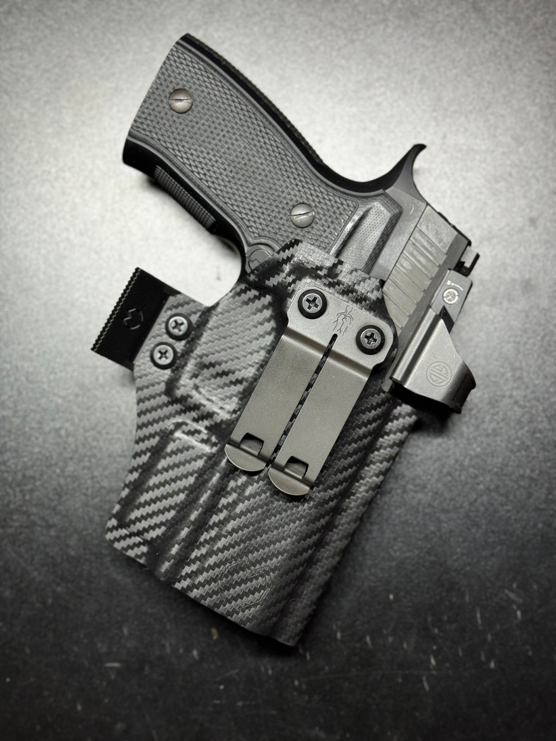 Custom-molded Kydex holster with RMR cut, compatible with popular reflex sights.