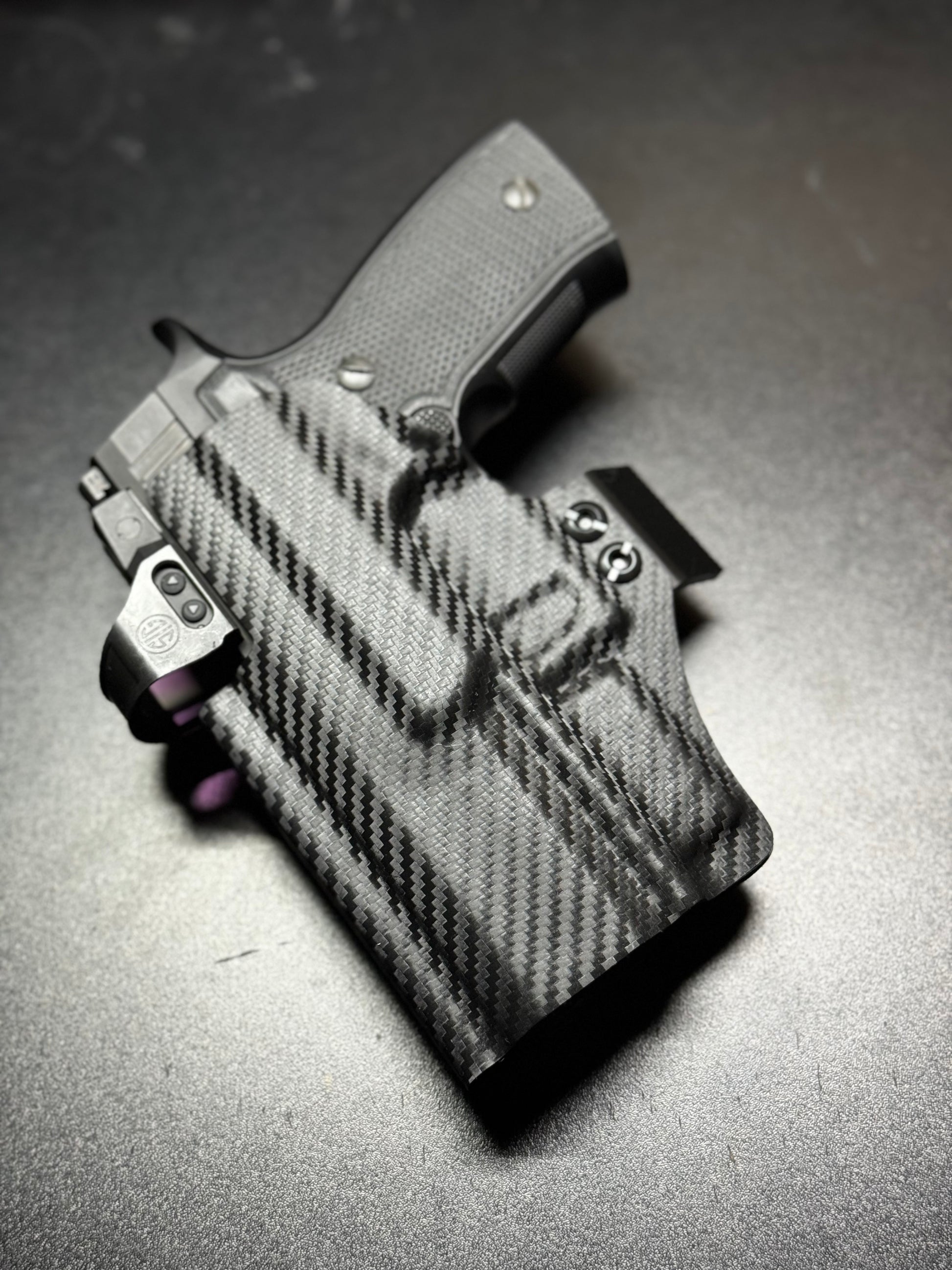 Custom-molded Kydex holster with RMR cut, compatible with popular reflex sights.
