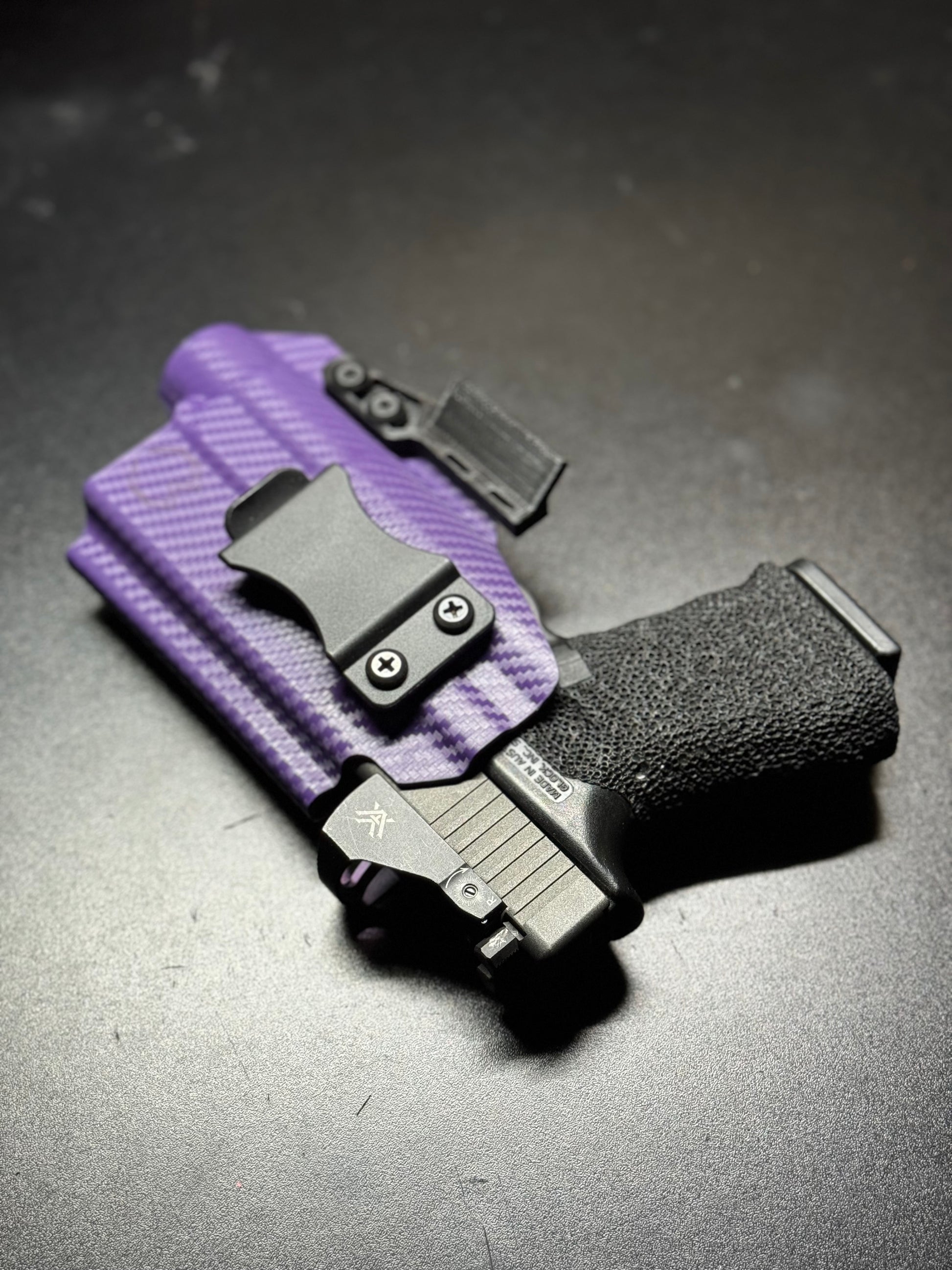 Custom-molded Kydex holster with RMR cut, compatible with popular reflex sights.